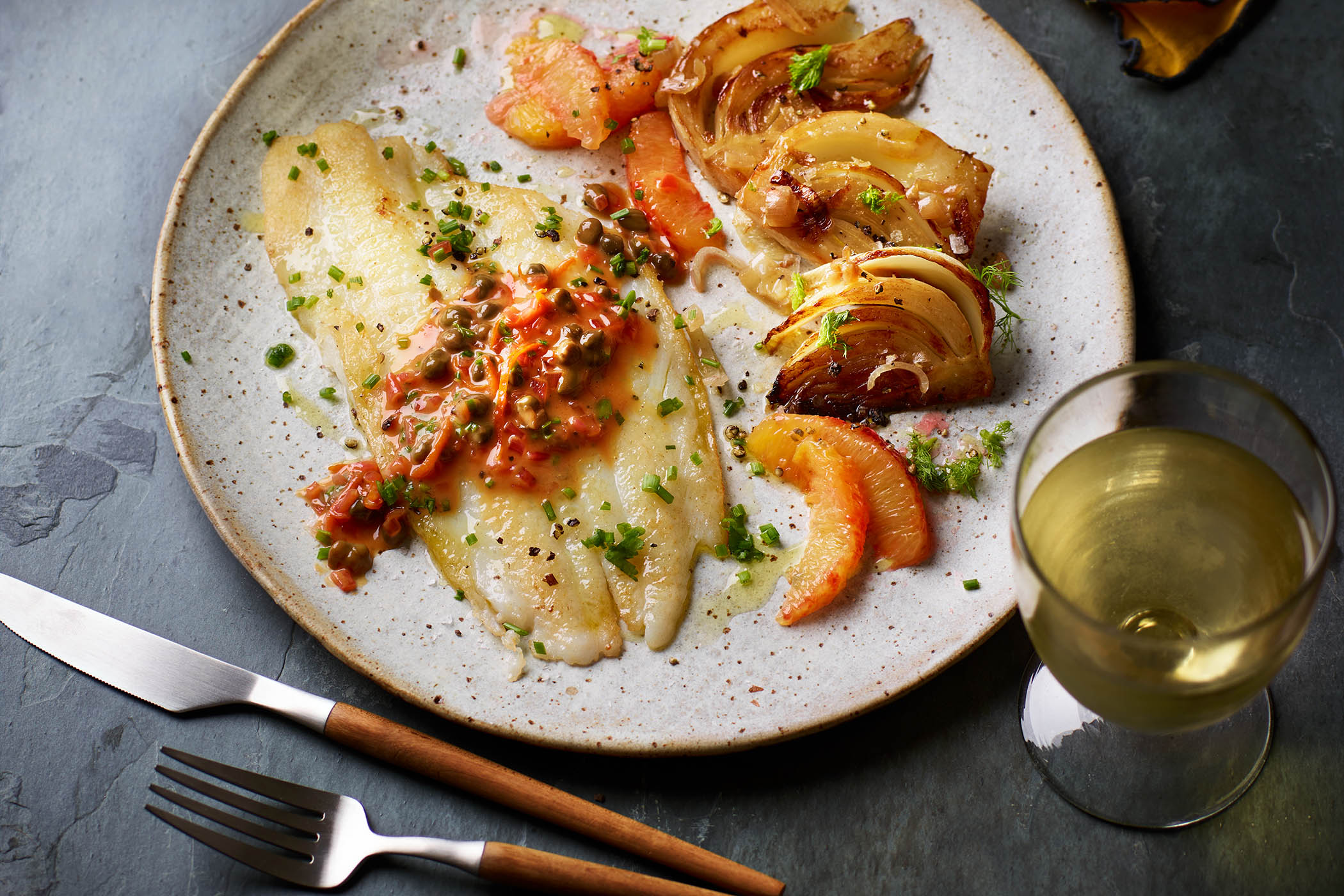 Grilled lemon sole with blood orange, caper butter and fennel