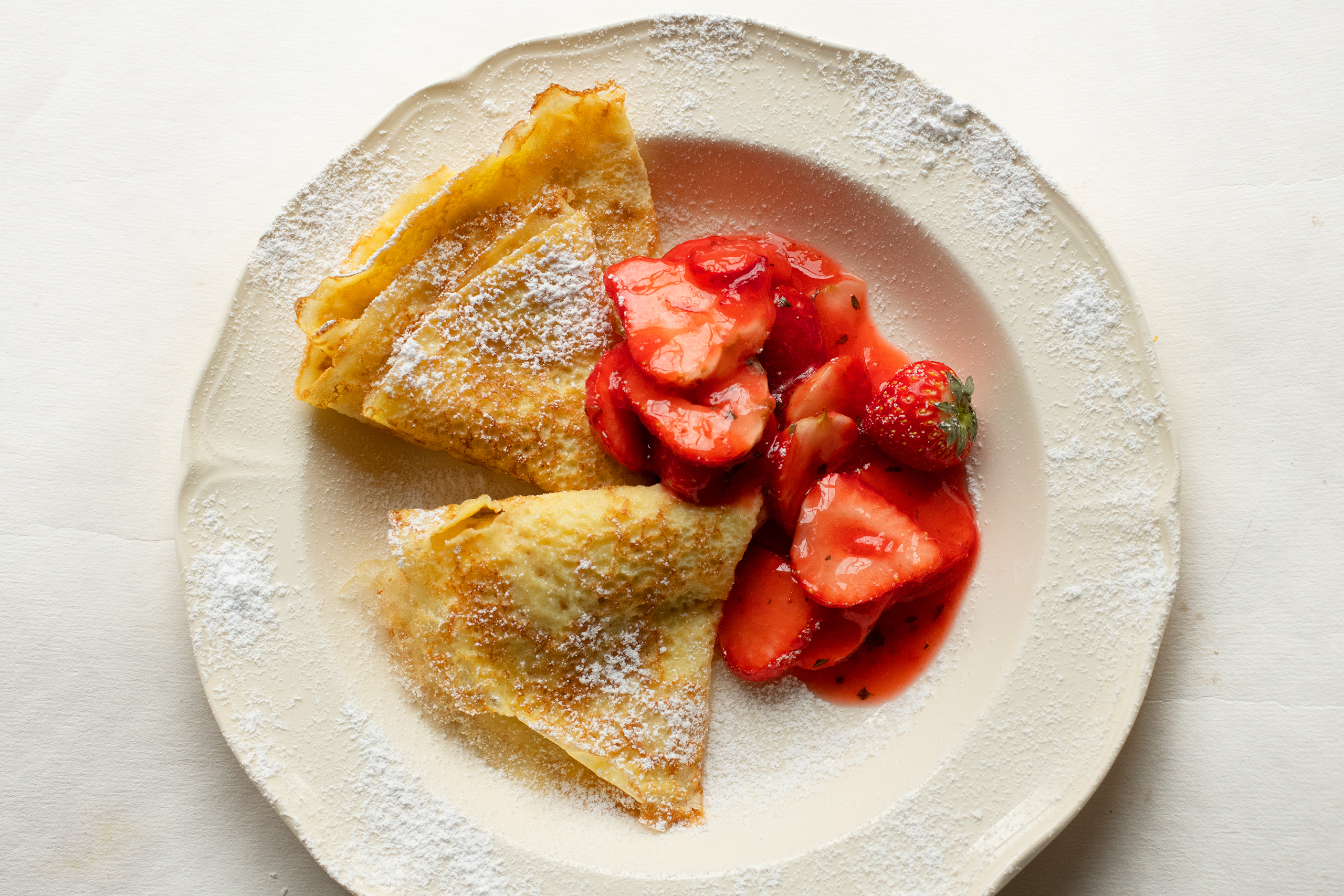 Nigel Slater's recipe for lemon pancakes with strawberry sauce